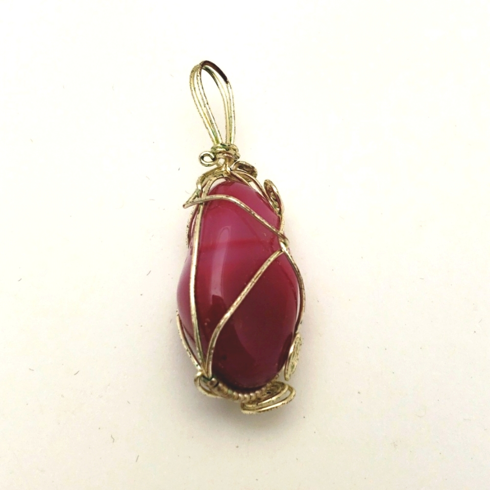 Wire wrapped stone magenta pendant